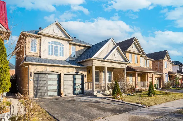 GTA home with a rear addition and raised deck