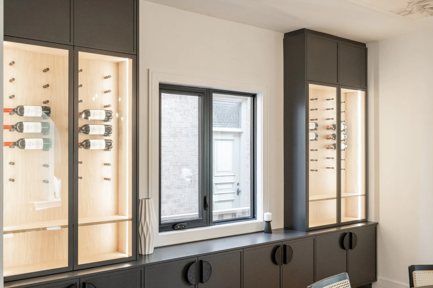 Custom lit wine display cabinetry near North York