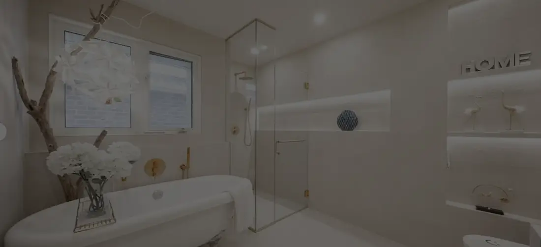 Bathroom with a freestanding tub and glass shower near Georgetown