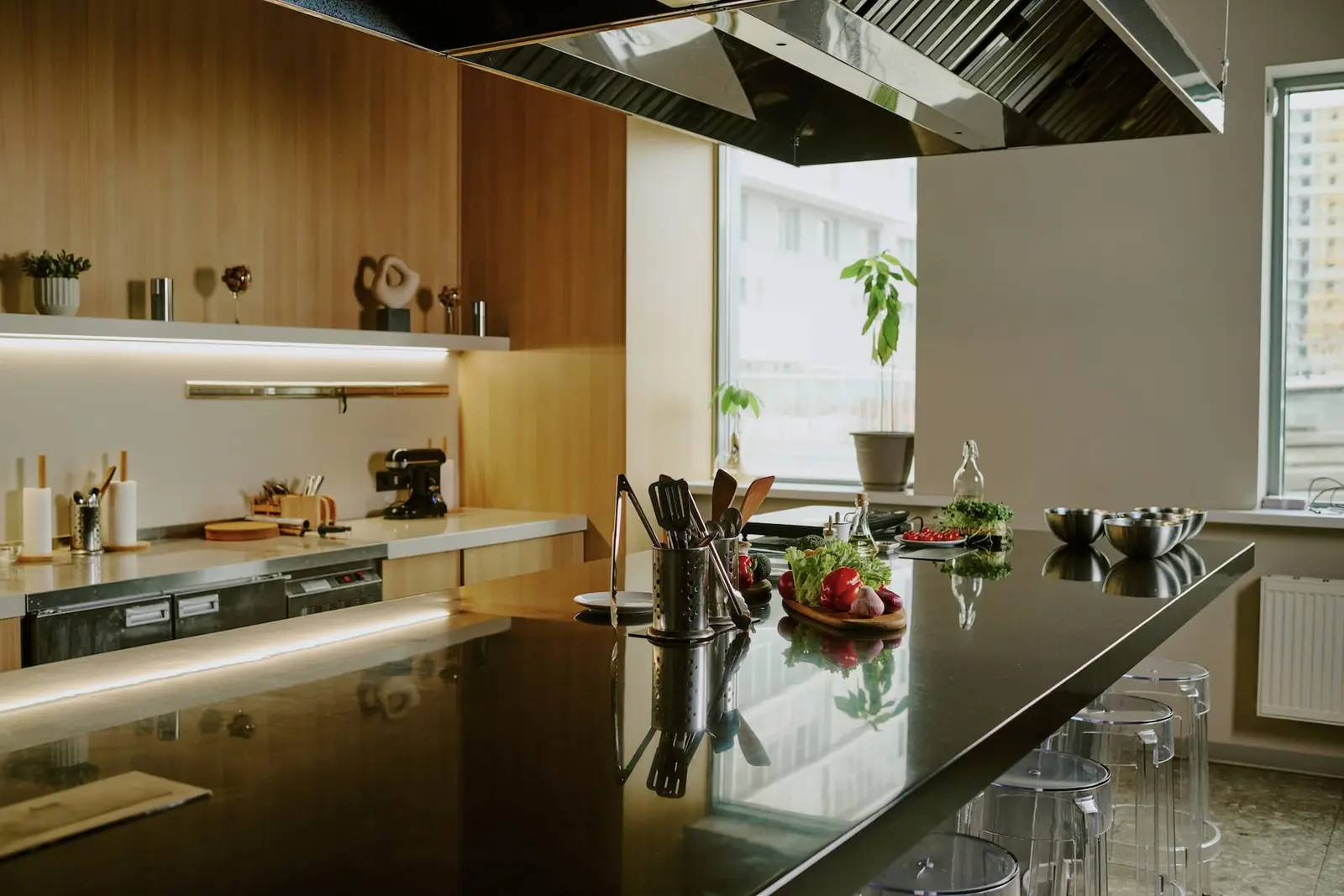 Contemporary kitchen with island seating and integrated appliances