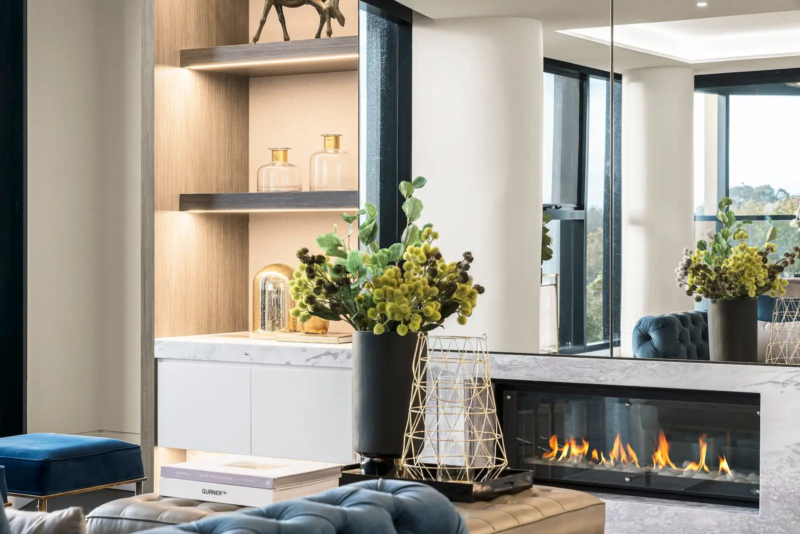 Finished lower level with built-in fireplace and living space