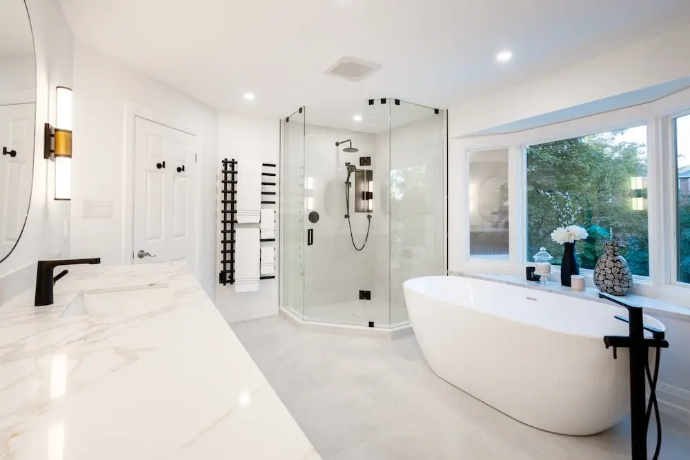 Bathroom with a glass walk-in shower and freestanding tub in Toronto