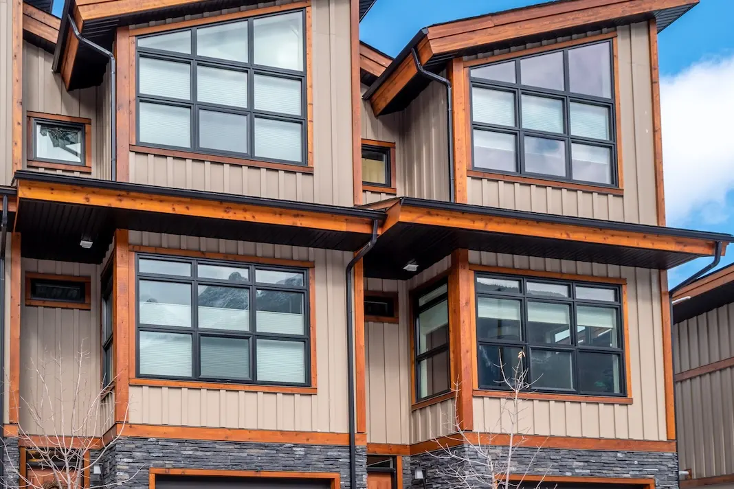 Three-storey multi-unit residential building with separate entrances